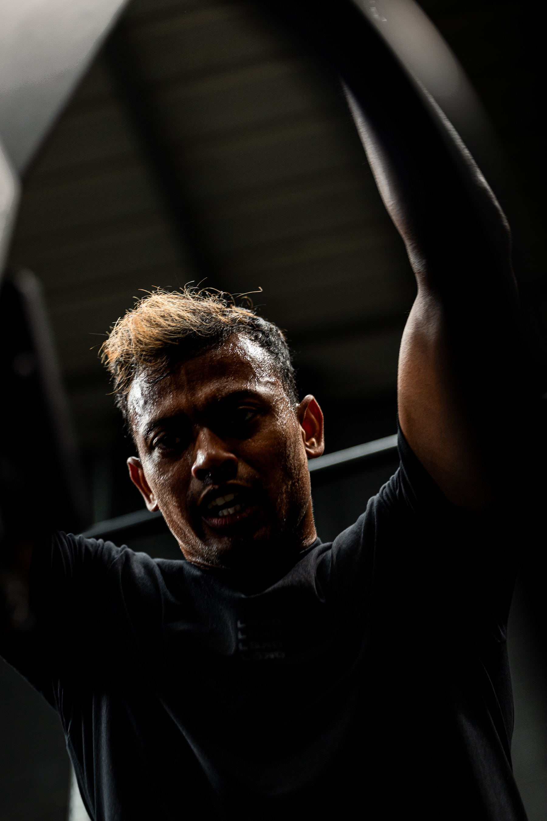 A member under a loaded barbell on the WSX platform